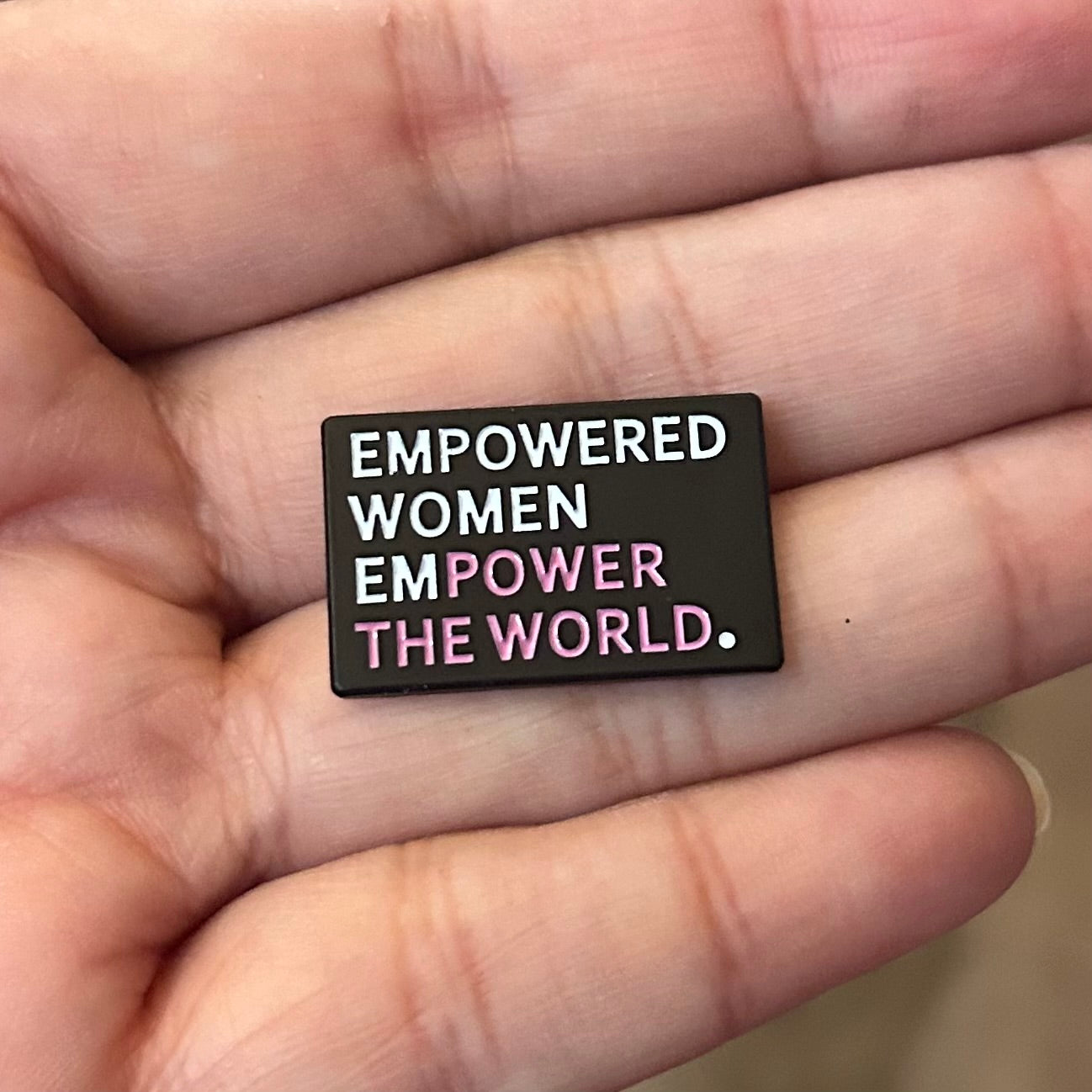 Empowered Women Power the World Enamel Pin