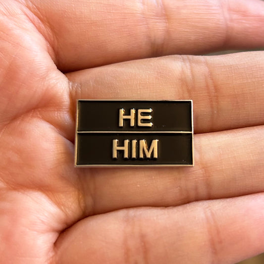 He/Him (silver lettering) Enamel Pin